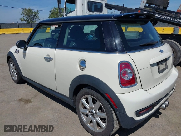 2011 MINI Hardtop S with VIN WMWSV3C50BTY23450, listed as a IAAI auction lot 42121502 with 239,025 mi miles and . Bid and sale history available at DreamBid. Image 3.