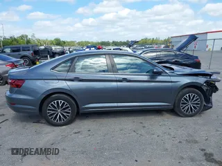 2021 Volkswagen Jetta S z VIN 3VWC57BU7MM013061, wystawiony jako IAAI lot #42148885 z przebiegiem 47 367 mil mil oraz . Historia ofert i sprzedaży dostępna na DreamBid. Obrazek 14.
