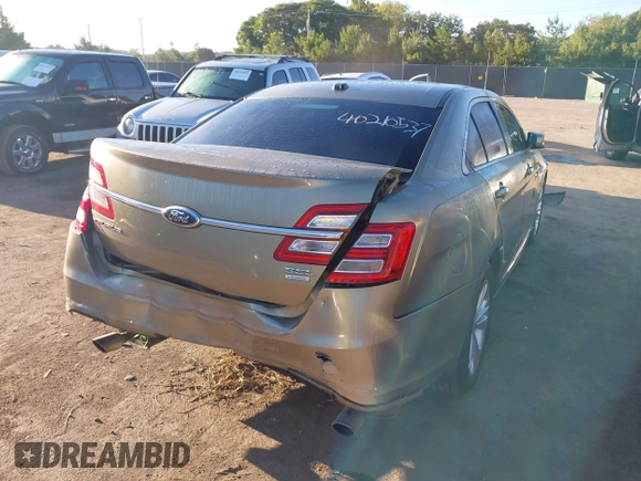 2013 Ford Taurus SEL with VIN 1FAHP2E91DG235771, listed as a IAAI auction lot 40210537 with 179,780 mi miles and . Bid and sale history available at carsss.com. Image 4.