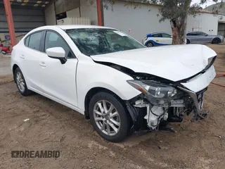 2015 Mazda 3 i Touring with VIN 3MZBM1V70FM231234, listed as a IAAI auction lot 42007526 with 114,255 mi miles. Bid and sale history available at carsss.com. Image 1.