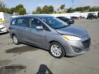 2015 Mazda 5 Sport with VIN JM1CW2BL4F0187914, listed as a Copart auction lot 54977265 with 141,919 mi miles and Salvage Title. Bid and sale history available at DreamBid. Image 4.