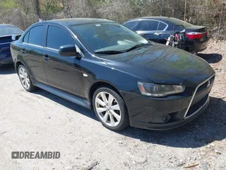 2012 Mitsubishi Lancer GT with VIN JA32U8FW6CU021485, listed as a IAAI auction lot 42159256 with 138,455 mi miles. Bid and sale history available at carsss.com. Image 1.
