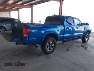 2017 Toyota Tacoma SR5 with VIN 3TMBZ5DN1HM009204, listed as a IAAI auction lot 41301765 with 129,923 mi miles and . Bid and sale history available at DreamBid. Image 4.