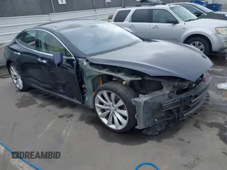 2014 Tesla Model S 60 z VIN 5YJSA1H10EFP30234, wystawiony jako IAAI lot #42182249 z przebiegiem 186 654 mil mil oraz . Historia ofert i sprzedaży dostępna na DreamBid. Obrazek 1.