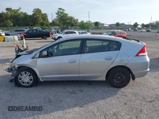 2010 Honda Insight LX with VIN JHMZE2H55AS039854, listed as a IAAI auction lot 42086147 with 153,555 mi miles and . Bid and sale history available at DreamBid. Image 14.