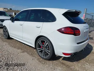 2013 Porsche Cayenne GTS with VIN WP1AD2A25DLA77759, listed as a IAAI auction lot 42316241 with 212,034 mi miles and . Bid and sale history available at DreamBid. Image 3.