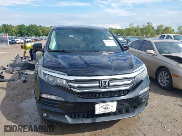 2016 Honda Pilot EX-L with VIN 5FNYF6H5XGB031594, listed as a IAAI auction lot 40409867 with 132,227 mi miles. Bid and sale history available at carsss.com. Image 12.