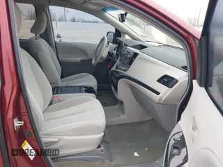 2014 Toyota Sienna LE AAS with VIN 5TDKK3DC6ES487962, listed as a IAAI auction lot 41568458 with 164,043 mi miles. Bid and sale history available at carsss.com. Image 5.