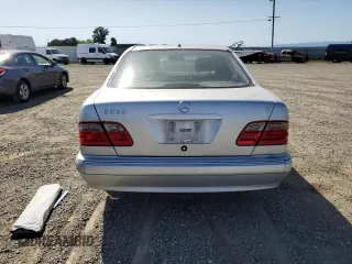 2000 Mercedes-Benz E-Class with VIN WDBJF65J4YB159268, listed as a Copart auction lot 50923115 with 127,650 mi miles and Salvage Title. Bid and sale history available at carsss.com. Image 6.