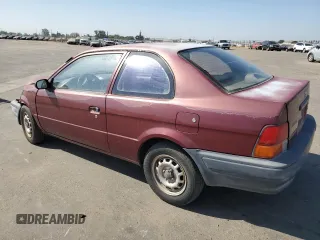 1996 Toyota Tercel DX z VIN JT2AC52L8T0124403, wystawiony jako Copart lot #66195834 z przebiegiem 137 467 mil mil oraz Szkody całkowita. Historia ofert i sprzedaży dostępna na DreamBid. Obrazek 2.