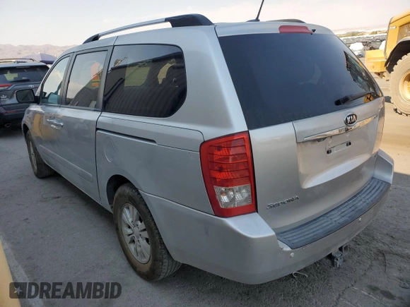 2012 Kia Sedona LX with VIN KNDMG4C71C6492455, listed as a Copart auction lot 63077744 with 210,306 mi miles and Salvage Title. Bid and sale history available at carsss.com. Image 2.