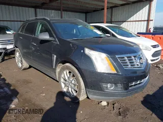 2014 Cadillac SRX Premium Collection z VIN 3GYFNDE34ES581728, wystawiony jako IAAI lot #41578226 z przebiegiem 121 118 mil mil oraz . Historia ofert i sprzedaży dostępna na DreamBid. Obrazek 1.