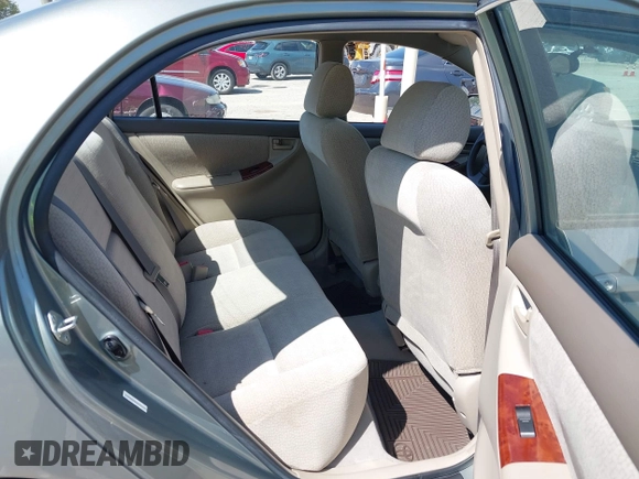 2004 Toyota Corolla CE with VIN 1NXBR32EX4Z336158, listed as a IAAI auction lot 42180440 with 67,820 mi miles and . Bid and sale history available at DreamBid. Image 8.