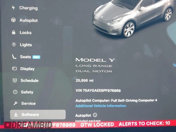 2023 Tesla Model Y Long Range with VIN 7SAYGAEE8PF976969, listed as a IAAI auction lot 41877784 with 25,896 mi miles. Bid and sale history available at carsss.com. Image 16.