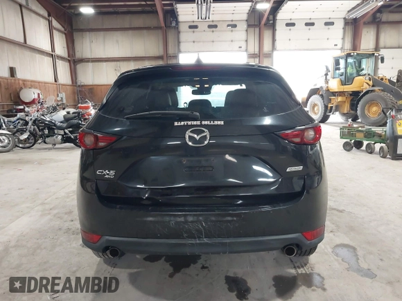 2017 Mazda CX-5 Grand Touring with VIN JM3KFBDL6H0143013, listed as a IAAI auction lot 41912979 with 122,890 mi miles. Bid and sale history available at carsss.com. Image 16.