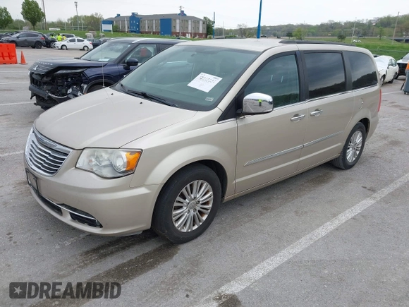 2012 Chrysler Town & Country Touring-L with VIN 2C4RC1CG3CR368471, listed as a IAAI auction lot 42045154 with 212,696 mi miles. Bid and sale history available at carsss.com. Image 2.