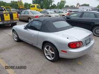 2002 Mazda MX-5 Miata Cloth with VIN JM1NB353820229890, listed as a IAAI auction lot 42750045 with 116,227 mi miles and . Bid and sale history available at DreamBid. Image 3.