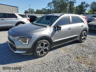 2023 Kia Niro SX Touring with VIN KNDCT3LE3P5083885, listed as a Copart auction lot 76116824 with 10,401 mi miles and Salvage Title. Bid and sale history available at carsss.com. Image 1.