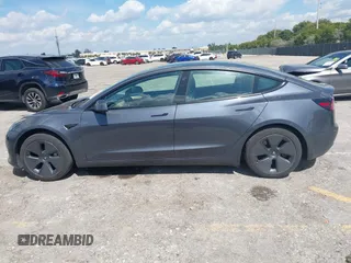 2023 Tesla Model 3 with VIN 5YJ3E1EA3PF623114, listed as a IAAI auction lot 41710385 with 31,663 mi miles and . Bid and sale history available at carsss.com. Image 14.