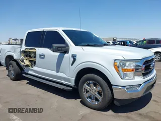 2021 Ford F-150 XL with VIN 1FTEW1CP4MKD82871, listed as a IAAI auction lot 42301025 with 54,757 mi miles and . Bid and sale history available at DreamBid. Image 6.