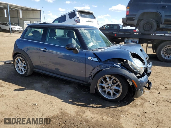2011 MINI Hardtop S with VIN WMWSV3C57BTY13899, listed as a Copart auction lot 55802555 with 73,012 mi miles and Salvage title. Bid and sale history available at DreamBid. Image 4.