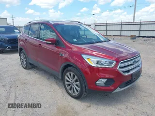 2018 Ford Escape Titanium with VIN 1FMCU0J96JUD58854, listed as a IAAI auction lot 42590609 with 77,825 mi miles and . Bid and sale history available at DreamBid. Image 1.