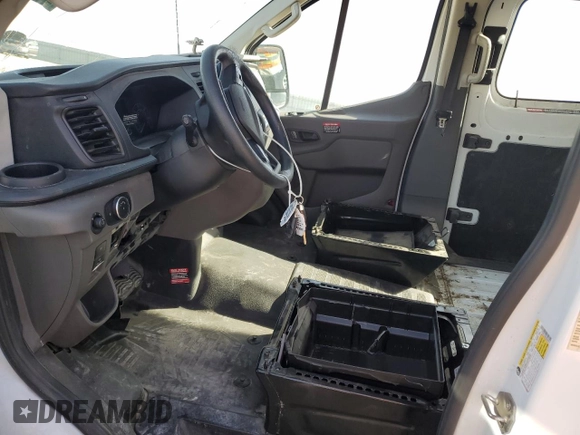 2023 Ford Transit Cargo with VIN 1FTBR1Y88PKB06810, listed as a Copart auction lot 47635095 with Not Provided miles and Salvage Title. Bid and sale history available at DreamBid. Image 7.