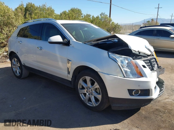 2013 Cadillac SRX Performance Collection with VIN 3GYFNDE37DS599557, listed as a IAAI auction lot 41633569 with 100,611 mi miles and . Bid and sale history available at DreamBid. Image 1.