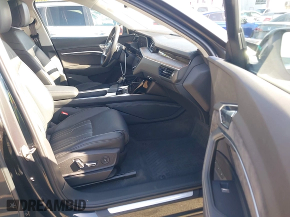 2019 Audi e-tron Prestige with VIN WA1VAAGE2KB021539, listed as a IAAI auction lot 42007353 with 14,238 mi miles and . Bid and sale history available at DreamBid. Image 5.