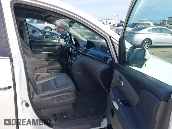 2016 Honda Odyssey EX-L z VIN 5FNRL5H60GB011001, wystawiony jako IAAI lot #41897958 z przebiegiem 126 133 mil mil oraz . Historia ofert i sprzedaży dostępna na DreamBid. Obrazek 5.