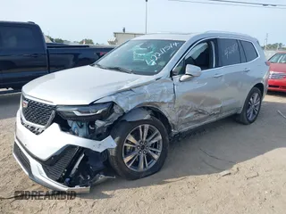 2020 Cadillac XT6 FWD Premium Luxury z VIN 1GYKPCRSXLZ136057, wystawiony jako IAAI lot #42211514 z przebiegiem 32 476 mil mil oraz . Historia ofert i sprzedaży dostępna na DreamBid. Obrazek 17.