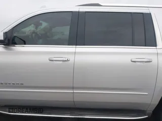 2015 Chevrolet Suburban LTZ with VIN 1GNSCKKC1FR507665, listed as a IAAI auction lot 41517753 with 162,604 mi miles. Bid and sale history available at carsss.com. Image 14.