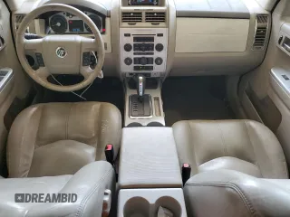 2008 Mercury Mariner Premier z VIN 4M2CU87108KJ13679, wystawiony jako Copart lot #56635785 z przebiegiem 166 732 mil mil oraz Szkody całkowita. Historia ofert i sprzedaży dostępna na DreamBid. Obrazek 8.
