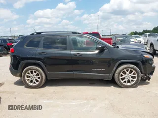 2016 Jeep Cherokee Sport with VIN 1C4PJLAB5GW297349, listed as a IAAI auction lot 42367544 with 142,930 mi miles and . Bid and sale history available at DreamBid. Image 13.