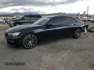 2019 BMW 7 Series 740i with VIN WBA7E2C55KB217499, listed as a Copart auction lot 43136573 with 36,419 mi miles. Bid and sale history available at carsss.com. Image 1.