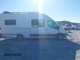 2022 Ford Transit Cargo with VIN 1FTBW3U85NKA01097, listed as a IAAI auction lot 41076643 with 24,786 mi miles and . Bid and sale history available at DreamBid. Image 13.