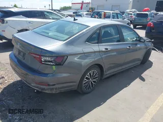 2021 Volkswagen Jetta S with VIN 3VWC57BU3MM065769, listed as a IAAI auction lot 42286921 with 59,128 mi miles and . Bid and sale history available at DreamBid. Image 4.
