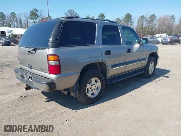 2003 Chevrolet Tahoe LS z VIN 1GNEK13T13J144304, wystawiony jako IAAI lot #41784000 z przebiegiem 363 478 mil mil oraz . Historia ofert i sprzedaży dostępna na DreamBid. Obrazek 4.
