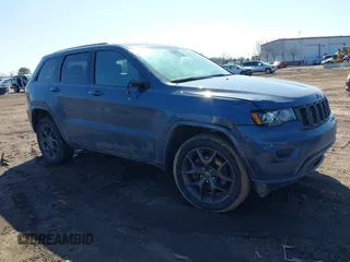 2021 Jeep Grand Cherokee Limited z VIN 1C4RJFBG4MC776556, wystawiony jako IAAI lot #41689666 z przebiegiem 39 364 mil mil oraz . Historia ofert i sprzedaży dostępna na DreamBid. Obrazek 1.