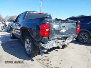 2017 Chevrolet Silverado 1500 LT with VIN 3GCPCREC2HG489005, listed as a IAAI auction lot 41756142 with 53,448 mi miles. Bid and sale history available at carsss.com. Image 3.