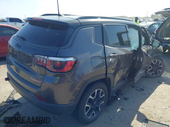 2019 Jeep Compass Trailhawk with VIN 3C4NJDDBXKT811171, listed as a IAAI auction lot 41786708 with 107,697 mi miles and . Bid and sale history available at carsss.com. Image 4.