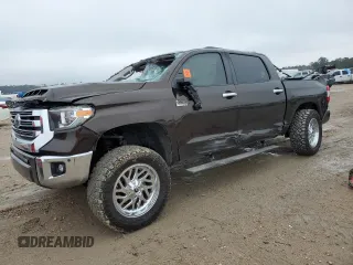 2019 Toyota Tundra SR5 z VIN 5TFAY5F15KX848587, wystawiony jako Copart lot #42734655 z przebiegiem 95 078 mil mil oraz Czysty tytuł • Clean title. Historia ofert i sprzedaży dostępna na DreamBid. Obrazek 1.