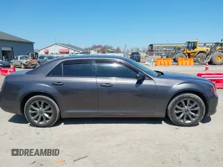 2014 Chrysler 300 with VIN 2C3CCAGG2EH384383, listed as a IAAI auction lot 42044047 with 114,271 mi miles. Bid and sale history available at carsss.com. Image 13.