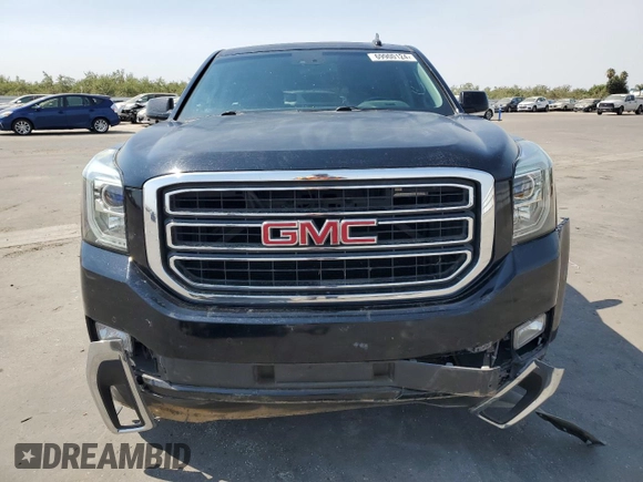 2016 GMC Yukon SLT with VIN 1GKS1BKCXGR122111, listed as a Copart auction lot 69900124 with 73,781 mi miles and Salvage Title. Bid and sale history available at carsss.com. Image 5.