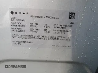 2023 Rivian R1S Adventure z VIN 7PDSGABAXPN019516, wystawiony jako Copart lot #73248104 z przebiegiem 11 525 mil mil oraz Szkody całkowita. Historia ofert i sprzedaży dostępna na DreamBid. Obrazek 14.