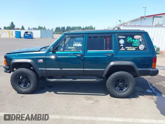 1995 Jeep Cherokee Sport with VIN 1J4FJ68S7SL631078, listed as a IAAI auction lot 42408148 with 190,765 mi miles and . Bid and sale history available at DreamBid. Image 14.