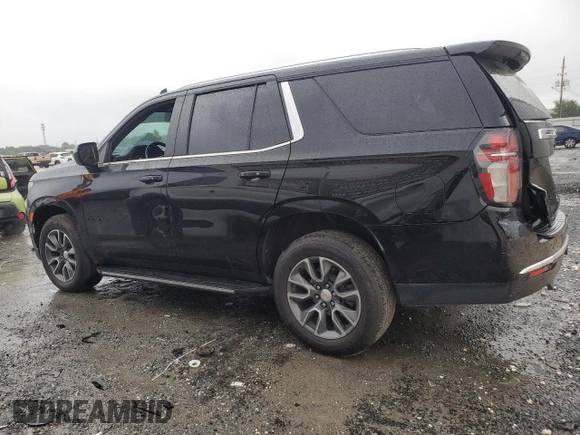 2021 Chevrolet Tahoe LS with VIN 1GNSCMKD4MR335973, listed as a Copart auction lot 69972594 with 42,129 mi miles and Salvage title. Bid and sale history available at DreamBid. Image 2.