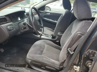 2014 Chevrolet Impala LS with VIN 2G1WA5E33E1127966, listed as a Copart auction lot 61458245 with 166,744 mi miles and Salvage title. Bid and sale history available at DreamBid. Image 7.