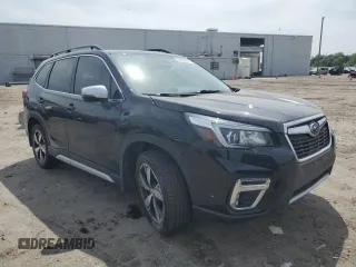 2020 Subaru Forester Touring with VIN JF2SKAXC0LH454331, listed as a Copart auction lot 54505345 with 76,416 mi miles and Salvage title. Bid and sale history available at DreamBid. Image 4.