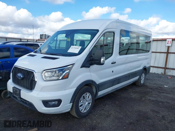 2023 Ford Transit Passenger XL with VIN 1FBAX2C82PKB28840, listed as a IAAI auction lot 41734942 with 20,504 mi miles and . Bid and sale history available at DreamBid. Image 2.